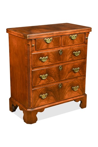 Lot 706 - A George II style walnut bachelor's chest, 20th century