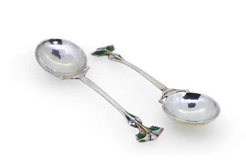 Lot 164 - A pair of silver and enamel spoons, possibly designed by George Connell