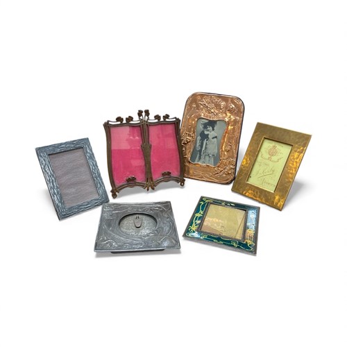 Lot 77 - An Art Nouveau copper faced photograph frame,...