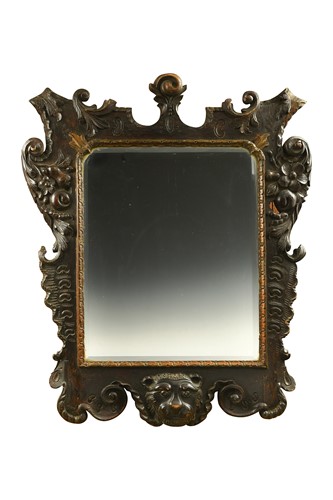 Lot 350 - A Continental carved softwood and parcel-gilt mirror, mid-18th century
