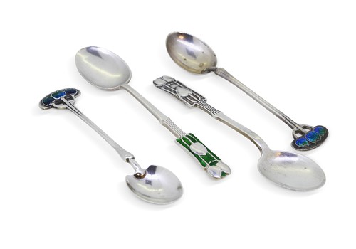 Lot 179 - William Hutton & Liberty & Co., a near pair of silver and enamel teaspoons