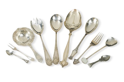 Lot 167 - A collection of Art Nouveau silver, plate and pewter cutlery and serving implements