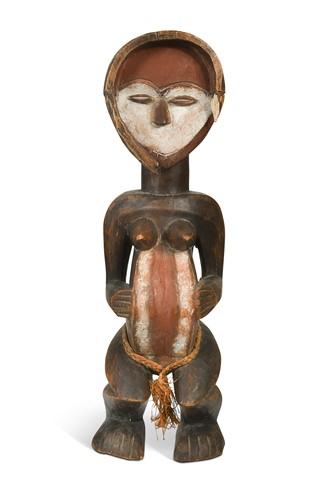 Lot 76 - A Kwele maternity or ancestor figure, Gabon