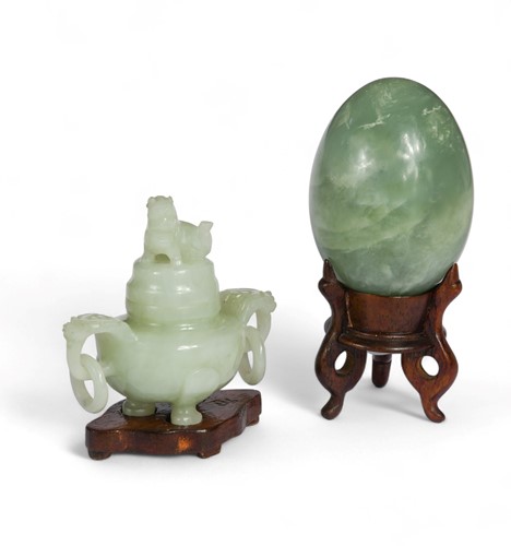 Lot 29 - A Chinese celadon jade small two-handled censer and cover