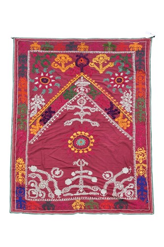 Lot 639 - An Uzbek cotton and silk cupboard cover, circa 1940/50
