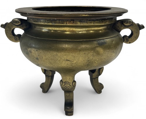 Lot 18 - A Chinese bronze tripod censer
