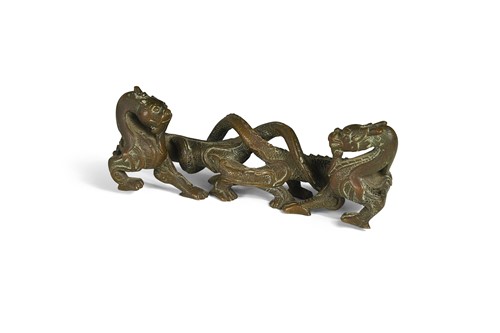 Lot 22 - A bronze brush-rest, 18th or 19th century