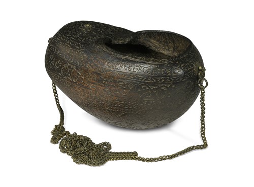 Lot 520 - A carved Coco-de-Mer Sufi medicants' begging bowl (Kashkul), probably 19th century