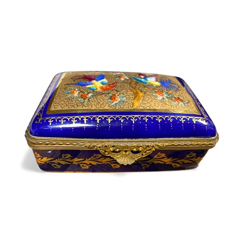 Lot 39 - A French gilt metal mounted porcelain box, the...