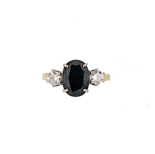 Lot 149 - A sapphire and diamond three stone ring