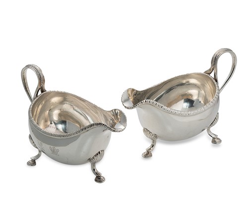 Lot 432 - Dublin - A pair of George III silver sauce boats