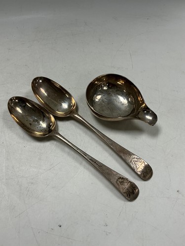 Lot 321 - A pair of George III silver spoons by Thomas &...
