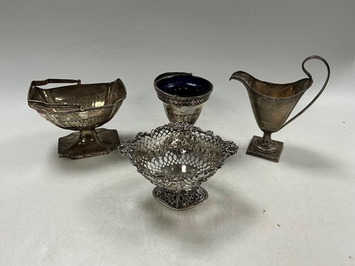 Lot 349 - A George III silver swing handle sugar basket