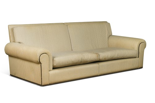 Lot 653 - A large ‘Coco Chanel’ sofa, upholstered in striped fabric