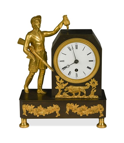 Lot 502 - A French bronze and gilt bronze sportsman mounted mantel timepiece, 19th century