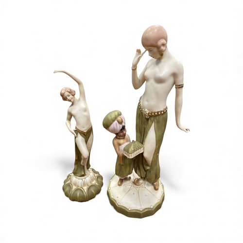 Lot 18 - Two Royal Dux figures of exotic dancers,...