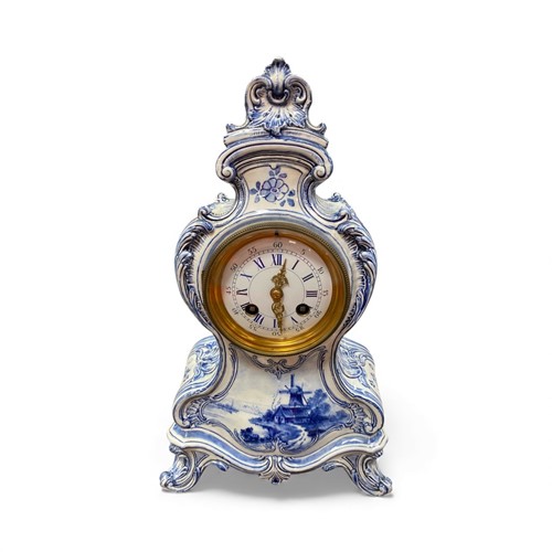 Lot 2 - A French Delft style Faience mantle clock,...