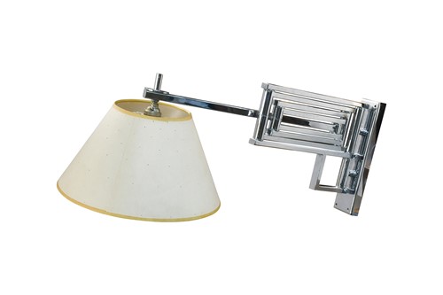 Lot 230 - A set of four chrome articulated extending wall lights, by Charles Edwards
