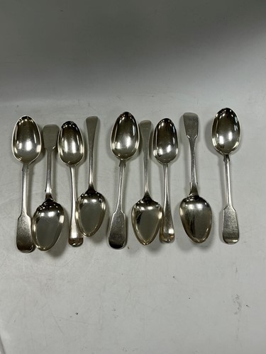 Lot 316 - A group of nine silver table spoons, various...