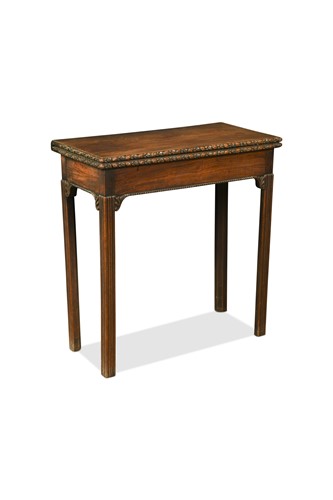 Lot 601 - A small George III mahogany tea table