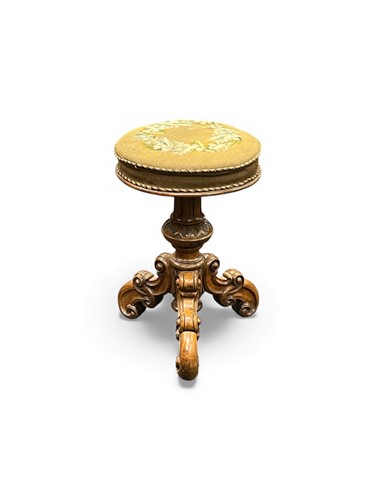 Lot 643 - A Victorian carved walnut piano stool 53 x 35cm
