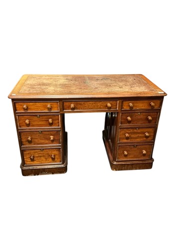 Lot 403 - A Victorian mahogany pedestal desk, set with...
