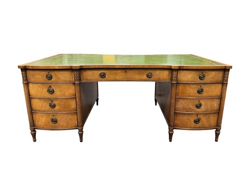 Lot 579 - A large reproduction mahogany veneered partners desk, late 20th century