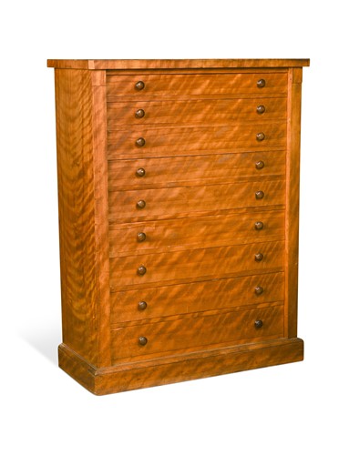 Lot 674 - A Victorian satinwood Wellington chest
