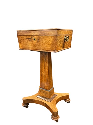 Lot 382 - A faux rosewood mahogany teapoy set on...