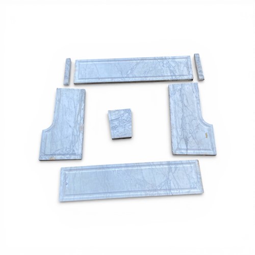 Lot 792 - A fragmented white marble fire surround 134cm...