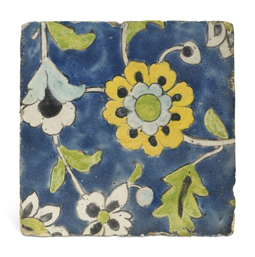 Lot 522 - A Persian Islamic Safavid cuerda seca tile, 17th century