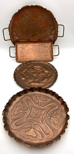 Lot 73 - An Art Nouveau copper twin-handled tray;...