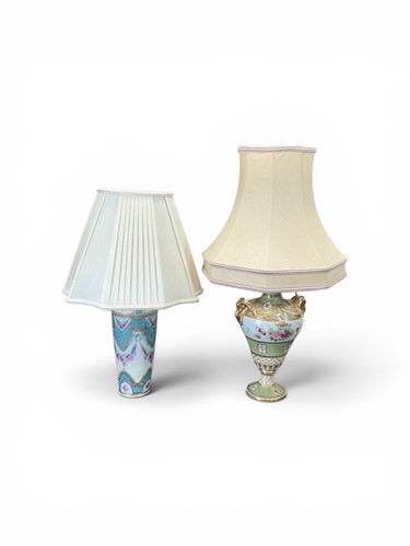 Lot 34 - Two floral and gilt china lamps, one of...