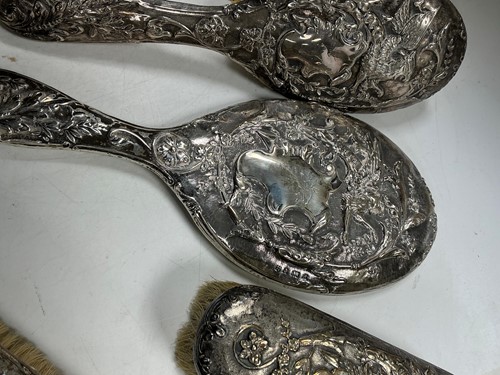 Lot 310 - A collection of assorted silver items to...