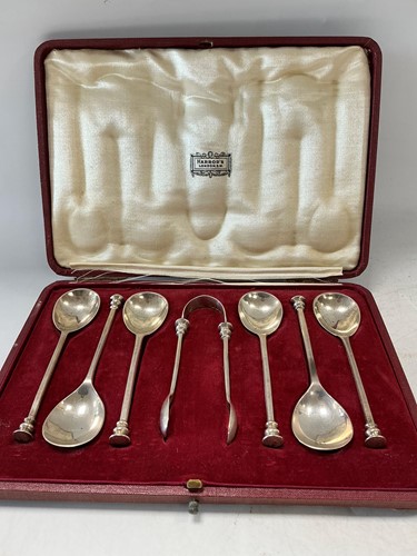Lot 325 - A boxed set of hallmarked silver spoons and...