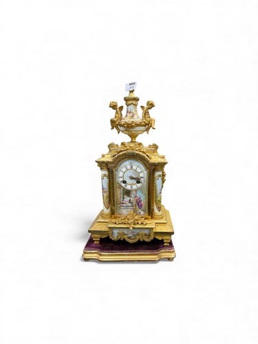 Lot 67 - A French 19th century gilt metal mantel clock,...