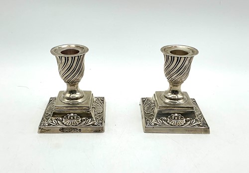 Lot 6 - A pair of Victorian silver dwarf candlesticks