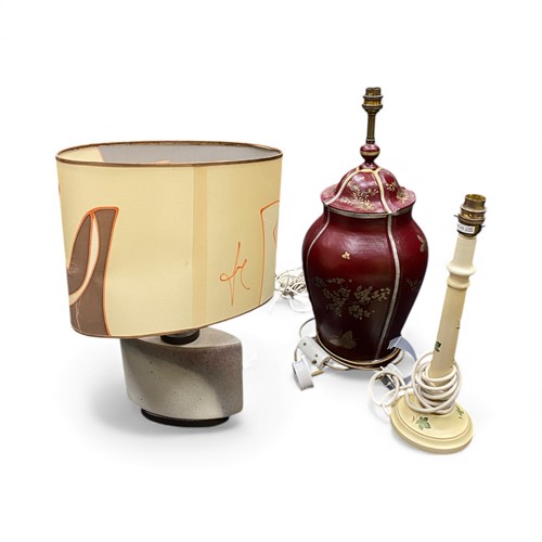 Lot 58 - A group of lamps to include a stoneware...