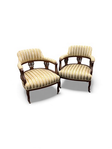 Lot 637 - A pair of Edwardian mahogany tub chairs or...
