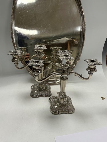Lot 297 - A pair of two branch silver plated candelabra,...