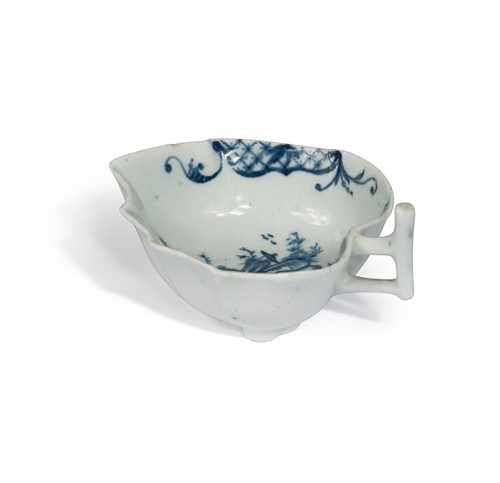 Lot 598 - A Worcester blue and white butter boat, circa 1758