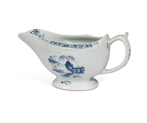Lot 599 - A Lowestoft blue and white sauceboat, circa 1767