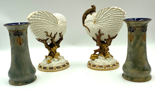 Lot 37 - A near pair of Worcester Nautilus shell vases