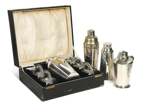 Lot 130 - A cased Art Deco electroplated cocktail shaker