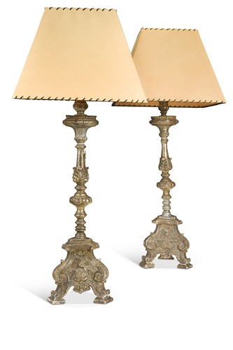 Lot 375 - A pair of silvered carved wood pricket stands converted to lamps, 19th century