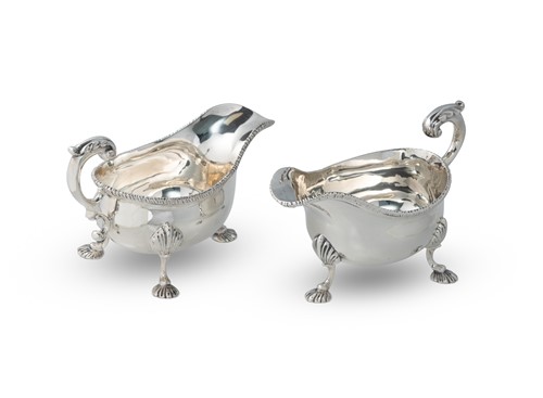 Lot 395 - A pair of Edward VII silver sauce boats