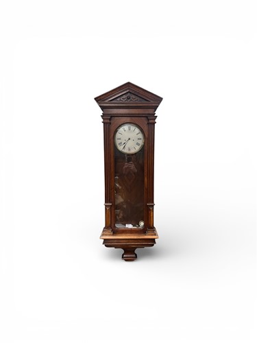 Lot 614 - A 19th century walnut wall regulator