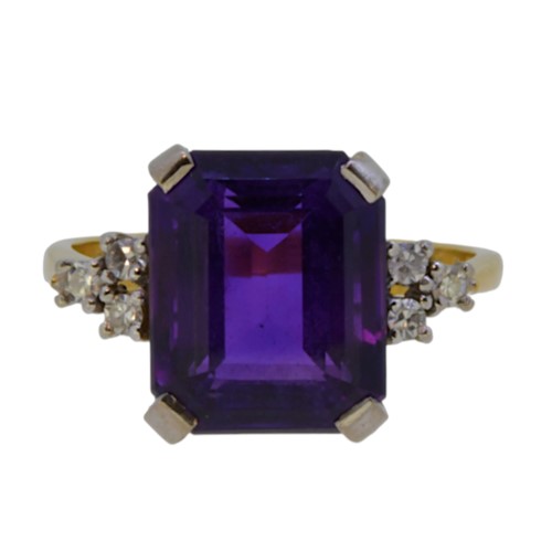 Lot 44 - An amethyst and diamond dress ring