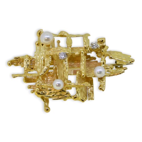 Lot 5 - A late 20th century pearl and diamond abstract brooch