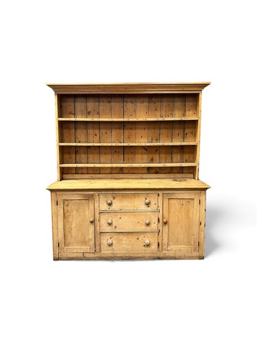 Lot 787 - A Victorian pine dresser, the upper section...